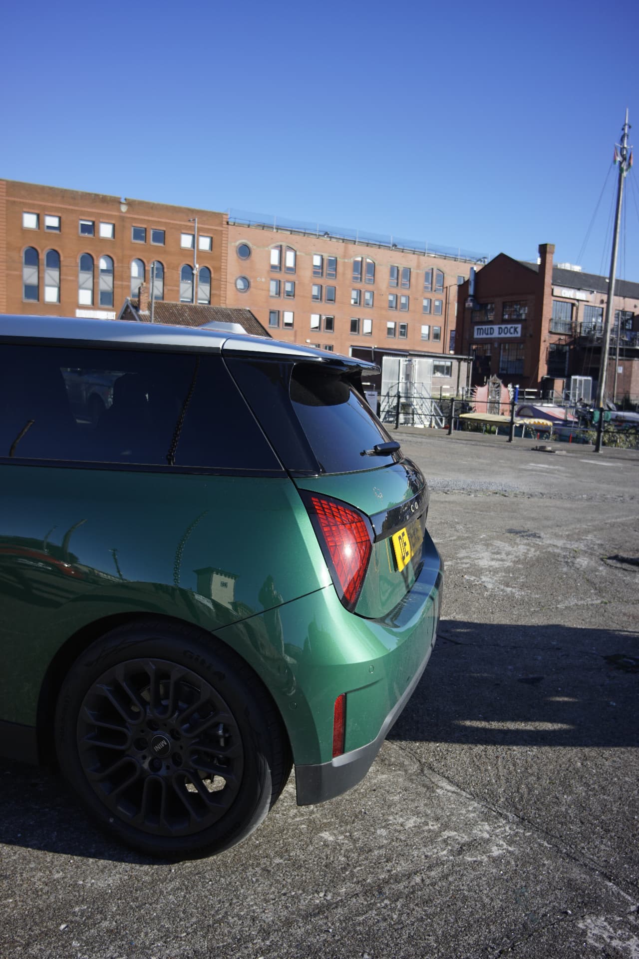 MINI Cooper E rear spoiler, green bodywork and black alloy wheel by Bristol's Mud Dock