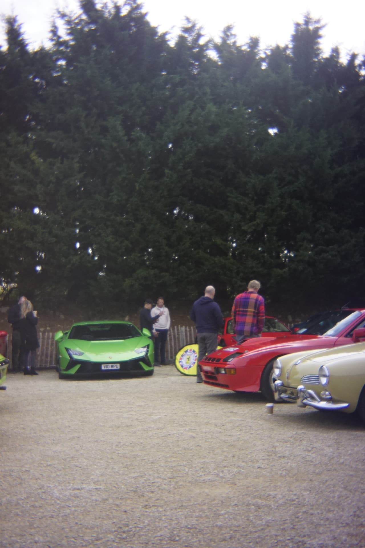 Green Lamborghini, red Porsche and classic Volkswagen at Coffee & Classics