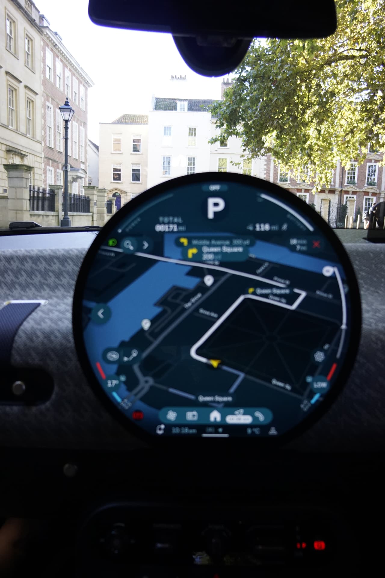 Circular central navigation screen and fabric dashboard inside the MINI Cooper E